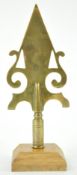 A 19th century West Country Friendly brass stave head, Paulton, on later mahogany plinth,