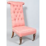 A Victorian prie-dieux button back chair,