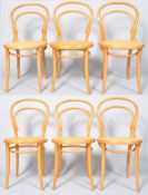 A set of six bent wood chairs with caned seats, stamped 'Drevouisa',