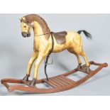 A 20th century carved rocking horse.