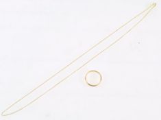 A stamped 375 gold fine curb chain together with a hallmarked 9ct gold wedding ring, size L.