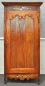 A 19th century French fruitwood armoire,