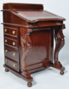 A 20th century mahogany davenport,