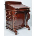 A 20th century mahogany davenport,