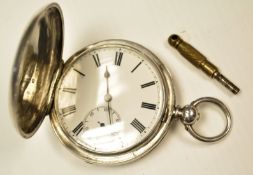 A silver 0.935 full hunter pocket watch. White dial with roman numerals.