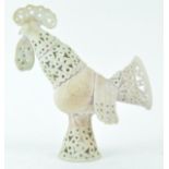 A Studio pottery figure of a cockerel with pierced decoration to the head, neck, wings and tail,