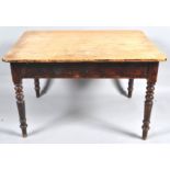A Victorian pine kitchen table with one frieze drawer on turned tapering legs, 76cm high x 122.