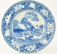 An early 19th century Rogers blue and white plate printed with stags and a cottage,