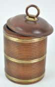 A cedar wood and brass bound tobacco box and cover with ring handles,