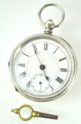 A silver 800 open face pocket watch. White dial with roman numerals.