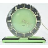 A Smiths electric Art Deco mantel clock, in green and black chrome bound case,