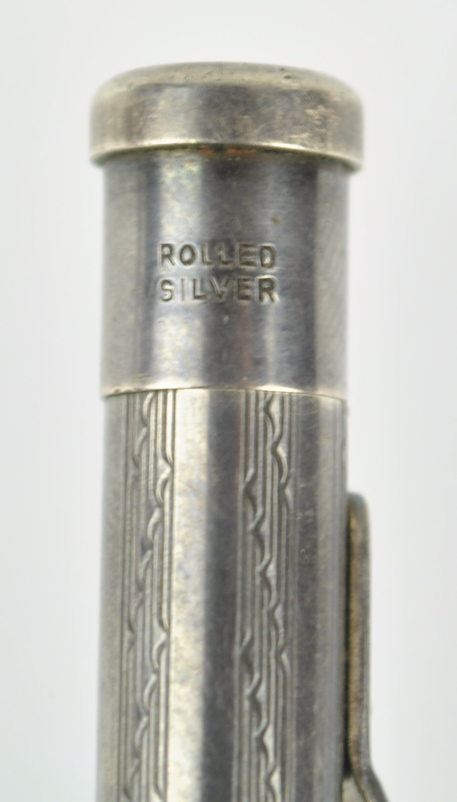 A yard'o'lead rolled silver propelling pencil with engine turned body, - Image 4 of 5