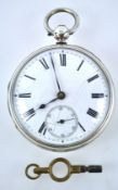 A sterling silver open face pocket watch. White dial with roman numerals.