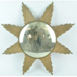 A gilt metal sunburst mirror frame, mid 20th century, with convex mirror,