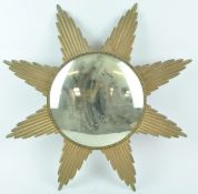 A gilt metal sunburst mirror frame, mid 20th century, with convex mirror,