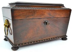 A William IV rosewood tea caddy, with gilt lion mask and ring handles, lacking interior, 20.