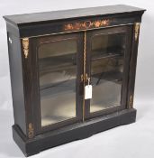 A Victorian ebonised pier cabinet, the frieze with marquetry flowers,