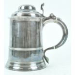 A silver tankard, of tapering cylindrical form,