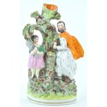 A large Staffordshire pottery figure group, circa 1840,