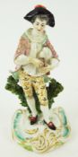 A late 19th century Sampson porcelain figure of a musician,