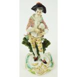 A late 19th century Sampson porcelain figure of a musician,