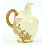 A Royal Worcester blush ivory jug, painted and gilded with flowers, factory marks in puce,