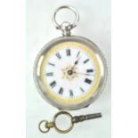 An Edwardian white metal ladies pocket watch, the enamel with gilded decoration,