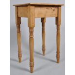 A small rectangular pine table, on turned legs, 72.5cm x 45.