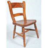 A 19th century country child's chair with double rail back,
