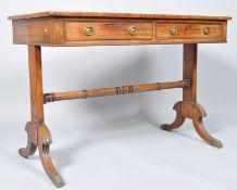 A 19th century mahogany sofa table with two frieze drawers and two faux drawers on rectangular