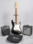 A 'Fender Squier Strat' electric guitar, two Squier SP10 amps,