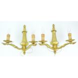 A pair of gilt brass twin branch wall lights,