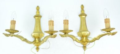 A pair of gilt brass twin branch wall lights,