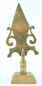 A 19th century West Country Friendly brass stave head, Portishead, on later mahogany plinth,