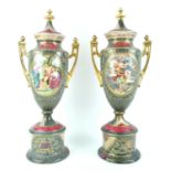 A pair of late 19th century Vienna style porcelain two handled urns and covers,