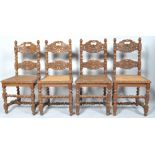 A set of four 19th century Continental oak chairs with carved backs,