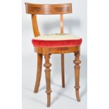 A Victorian mahogany cellists chair, with round tapestry seat on turned tapering legs,