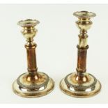A pair of Sheffield plate telescopic candlesticks, the detachable scones with beaded borders,