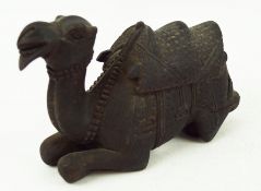 An Anglo Indian carved figure of a camel,