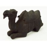 An Anglo Indian carved figure of a camel,