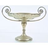 A tall silver two handled bon bon dish with pierced edge bowl on baluster stem and trumpet foot,