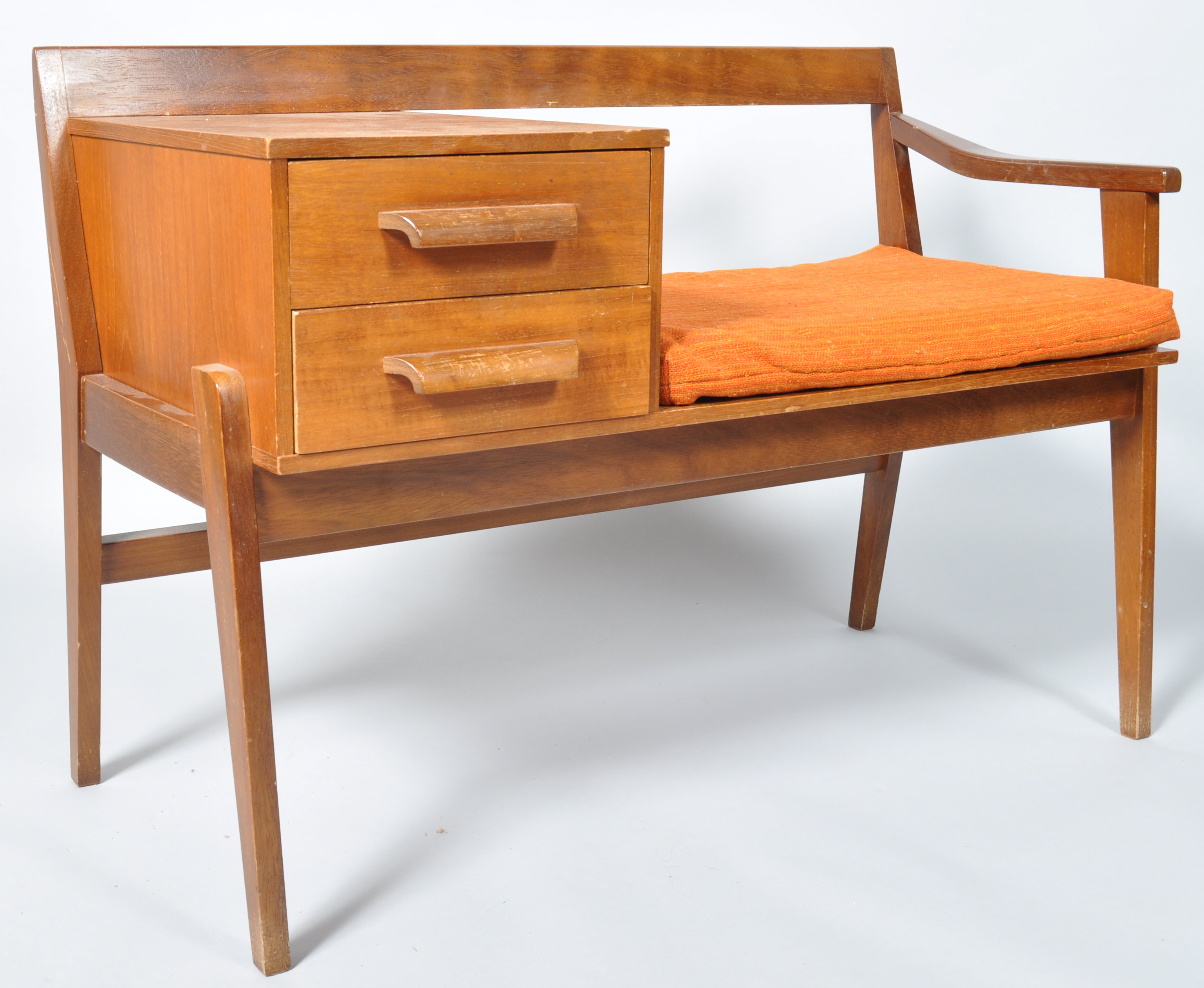 A 1960's retro vintage teak wood telephone table, with two drawers and adjacent seat,
