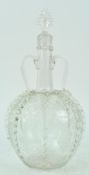 A late 19th century Dutch glass decanter, the spherical body decorated with etched panels of fruit,