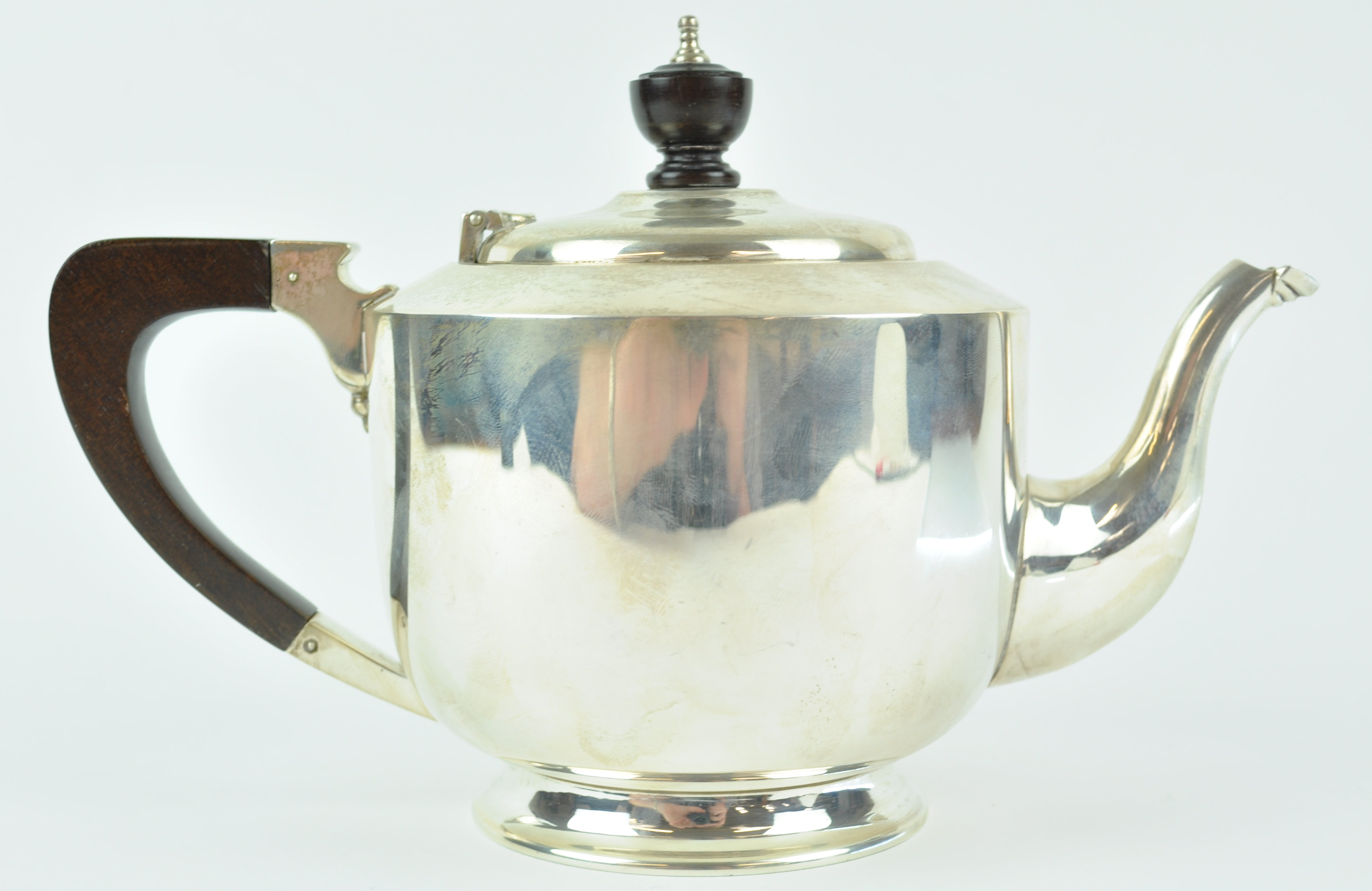 A silver teapot, of very plain cylindrical form with domed cover, on a flared foot, - Image 4 of 4