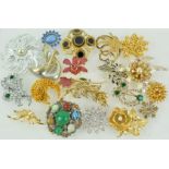 A collection of twenty costume brooches of variable design; gross weight: 397.