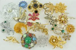 A collection of twenty costume brooches of variable design; gross weight: 397.