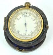 A pocket barometer, with silvered dial and leather travelling case, early 20th century,