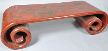 A Chinese style red japanned coffee table,