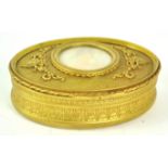 A 19th century French gilt metal box with faded inset miniature,