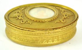 A 19th century French gilt metal box with faded inset miniature,